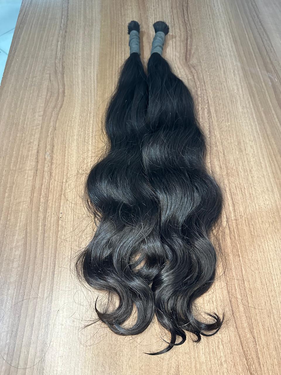 Duas mechas de cabelo brasileiro preto ondulado da Creative Hair